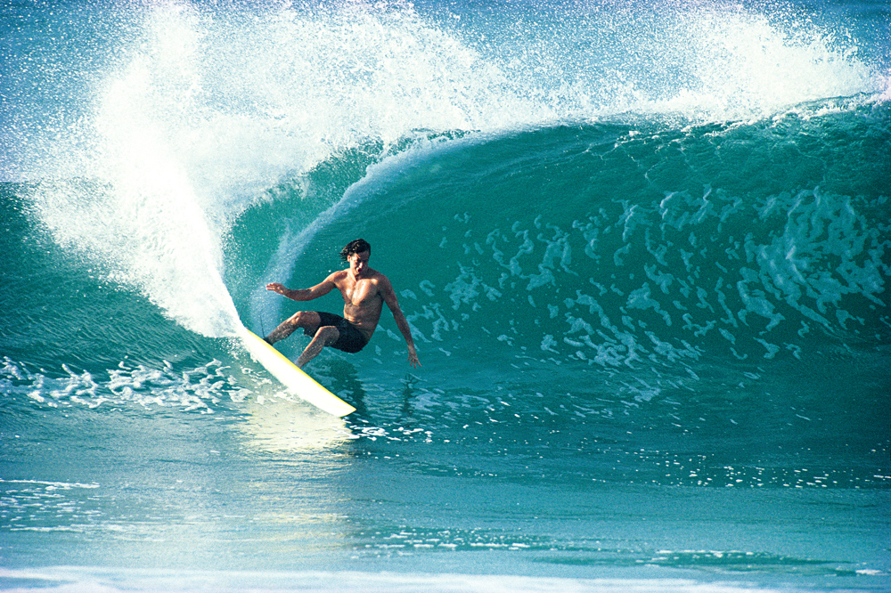 Tom Curren buries the rail at Off The Wall, photographed by Tom servais