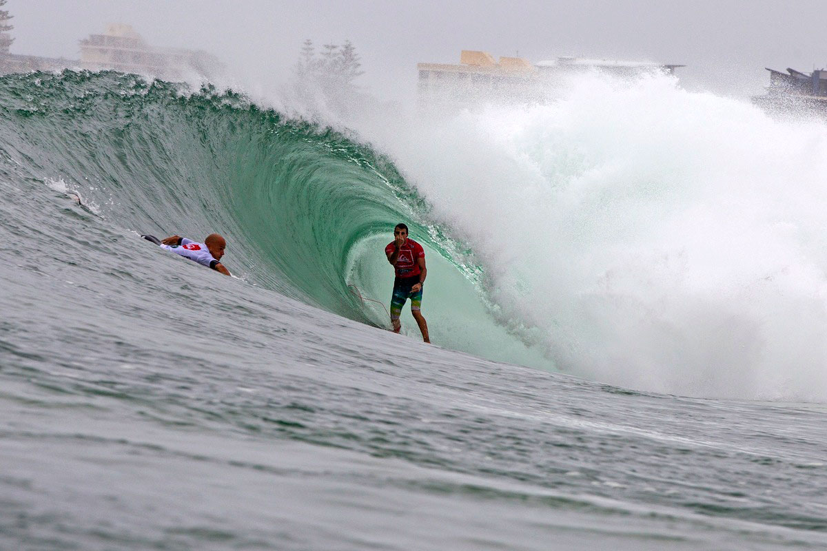 Joel Parkinson raises his middle finger at Kelly Slater during the final of the 2013 Quik Pro